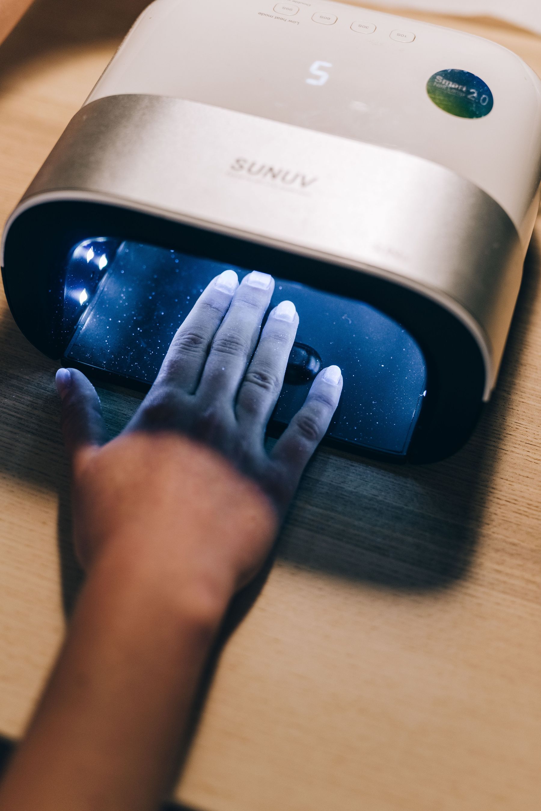 Séchage sous lampe à ongles